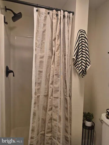 a bathroom with a sink a mirror and vanity