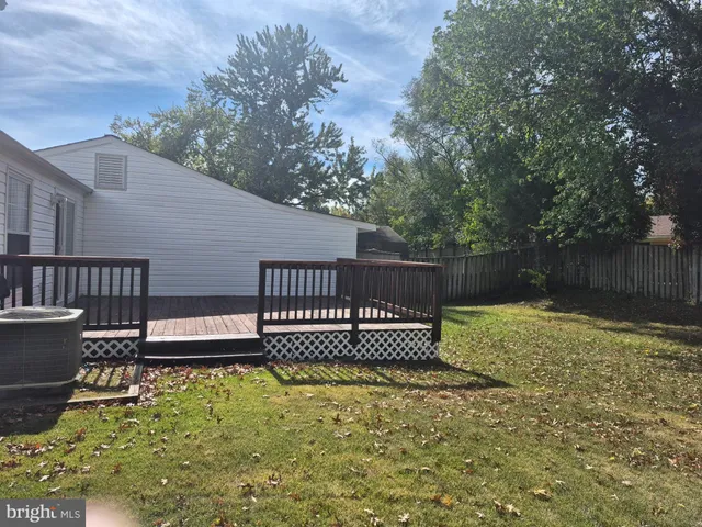 a view of a deck with a bench