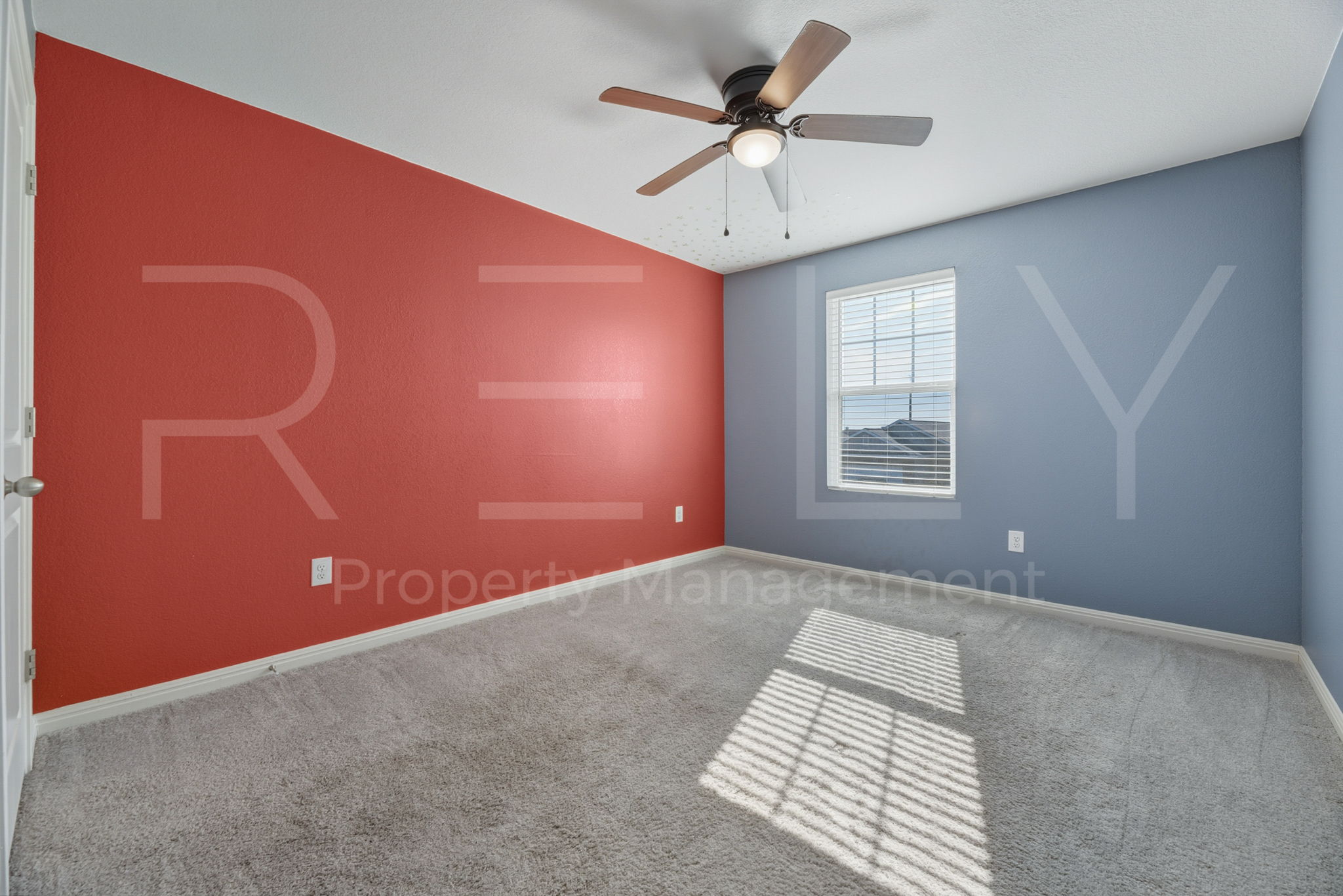 220 Wonderful Life Way Jarrell, TX 76537 - Photo 21 of 35 Carpeted empty room with vaulted ceiling and a ceiling fan