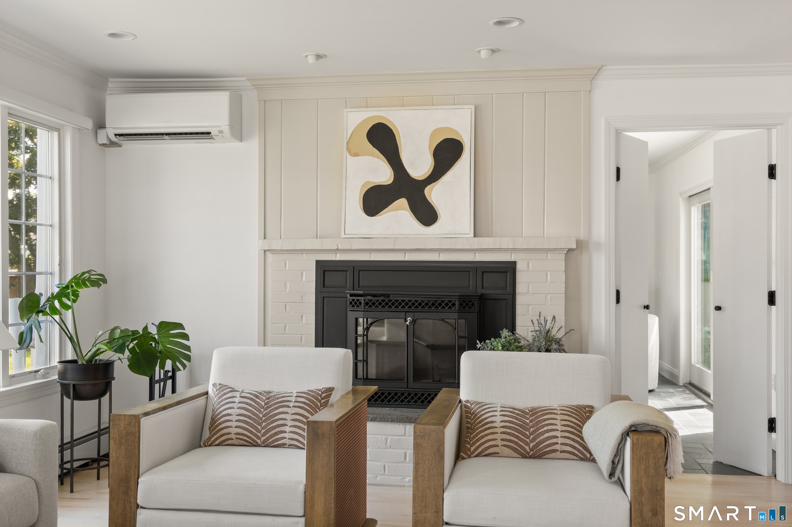108 Harbor Road Westport, CT 06880 - Photo 15 of 25 a living room with furniture and a fireplace