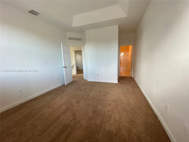 an empty room with an entryway