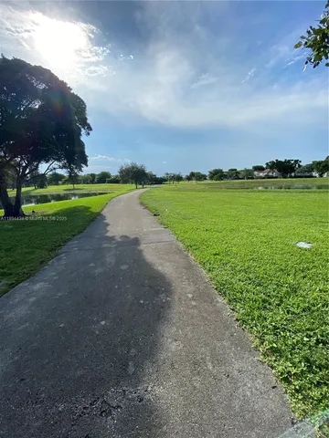 a view of a lake with a big yard