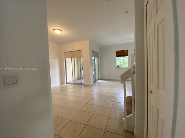 a view of a livingroom with a staircase