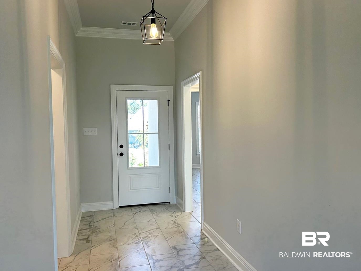 880 Sumter Loop Foley, AL 36535 - Photo 9 of 14 Doorway to outside with crown molding