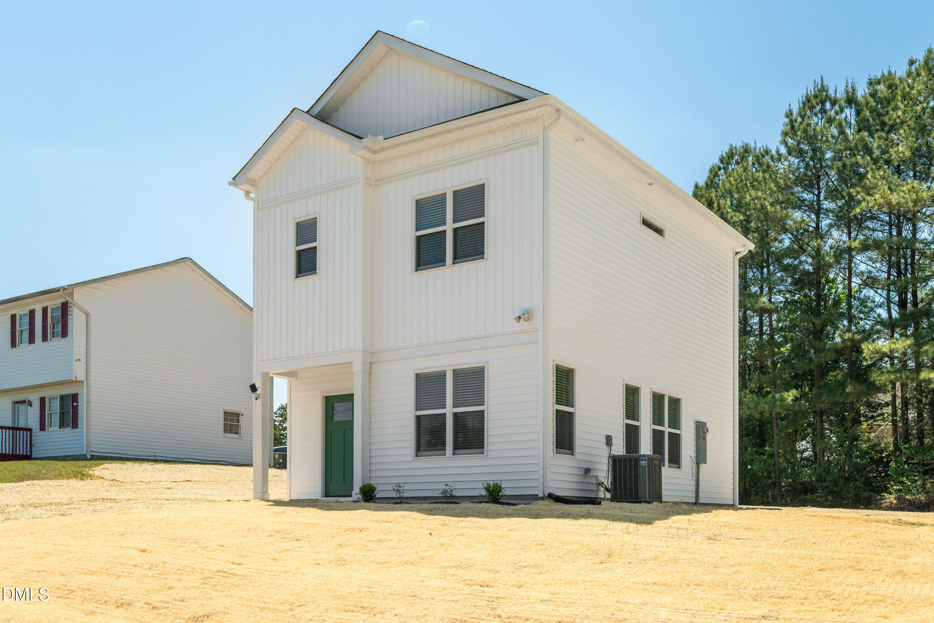 1196 Hurdle Mills Road Roxboro, NC 27573 - Photo 4 of 50 a front view of a house with a yard