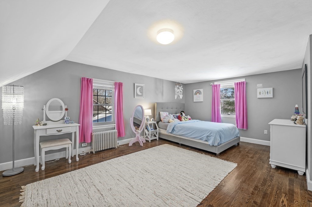 19 Walnut Road Swampscott, MA 01907 - Photo 26 of 36 a bedroom with a bed and dresser