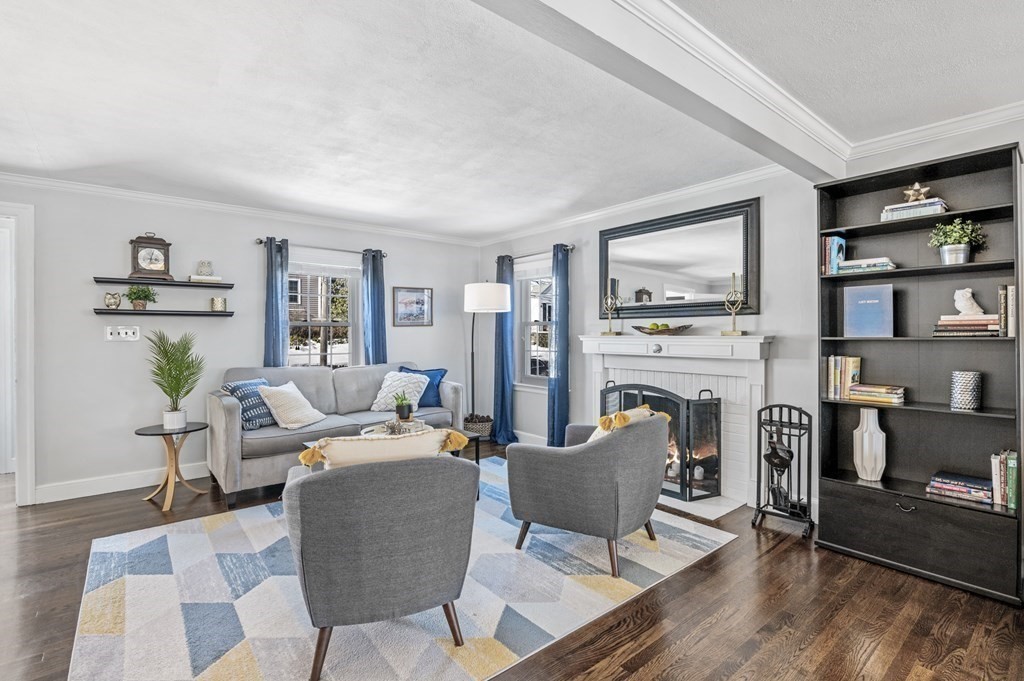 19 Walnut Road Swampscott, MA 01907 - Photo 3 of 36 a living room with furniture and a fireplace