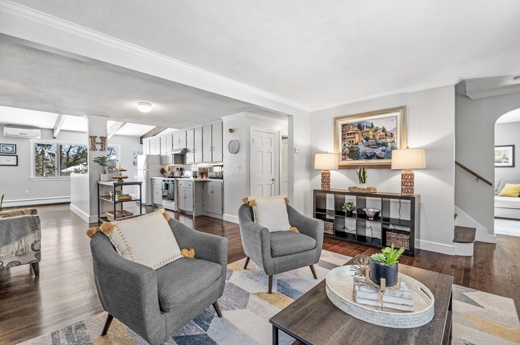 19 Walnut Road Swampscott, MA 01907 - Photo 6 of 36 a living room with furniture and a dining table with kitchen view