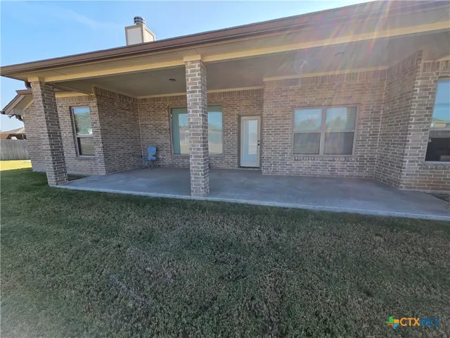 a picture of a bathroom with a shower