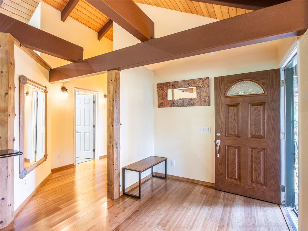4508 Waha Place Haiku, HI 96708 - Photo 7 of 30 a view of a hallway with wooden floor and staircase