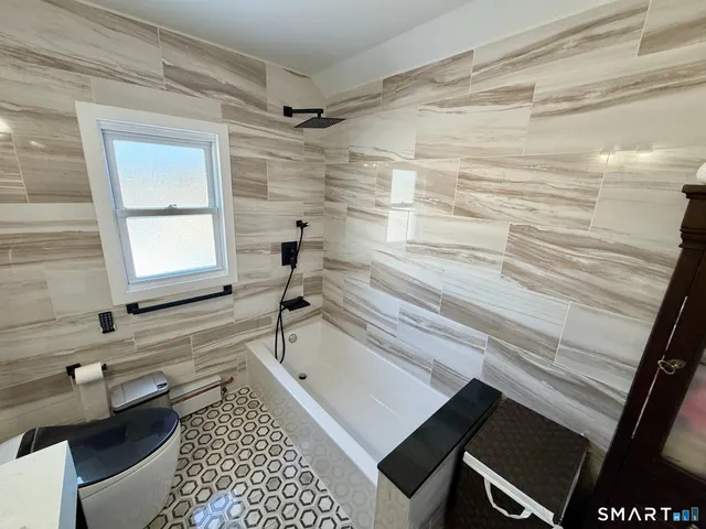 a bathroom with a sink and a bathtub