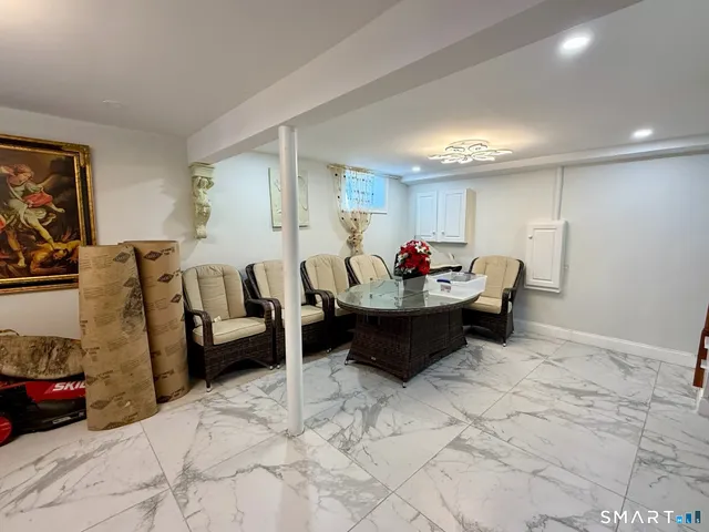 a living room with furniture and a couch