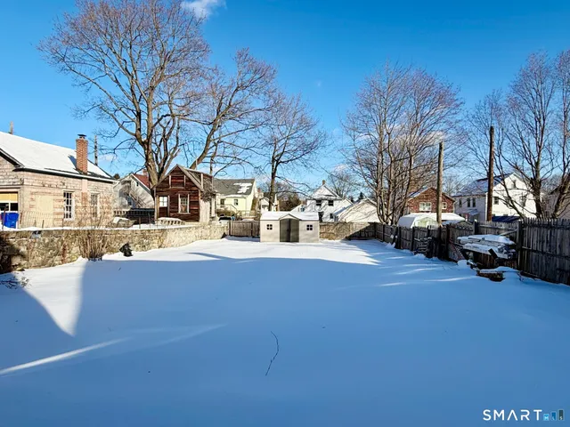 a view of a city street with a building