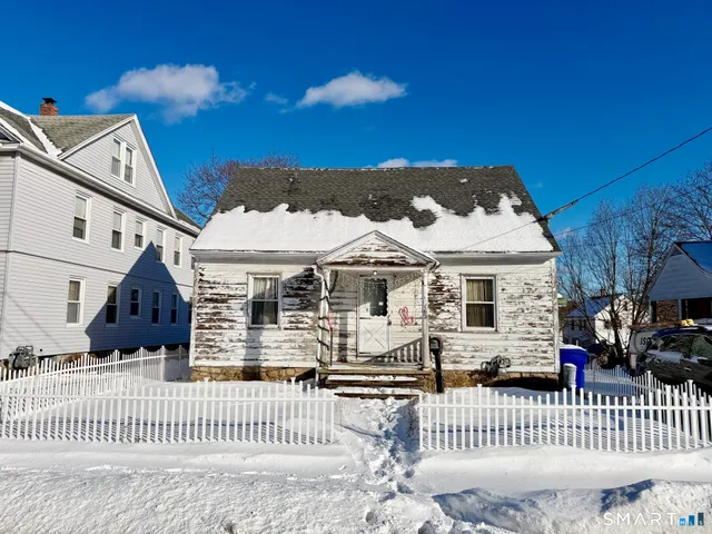 a front view of a house with a porch
