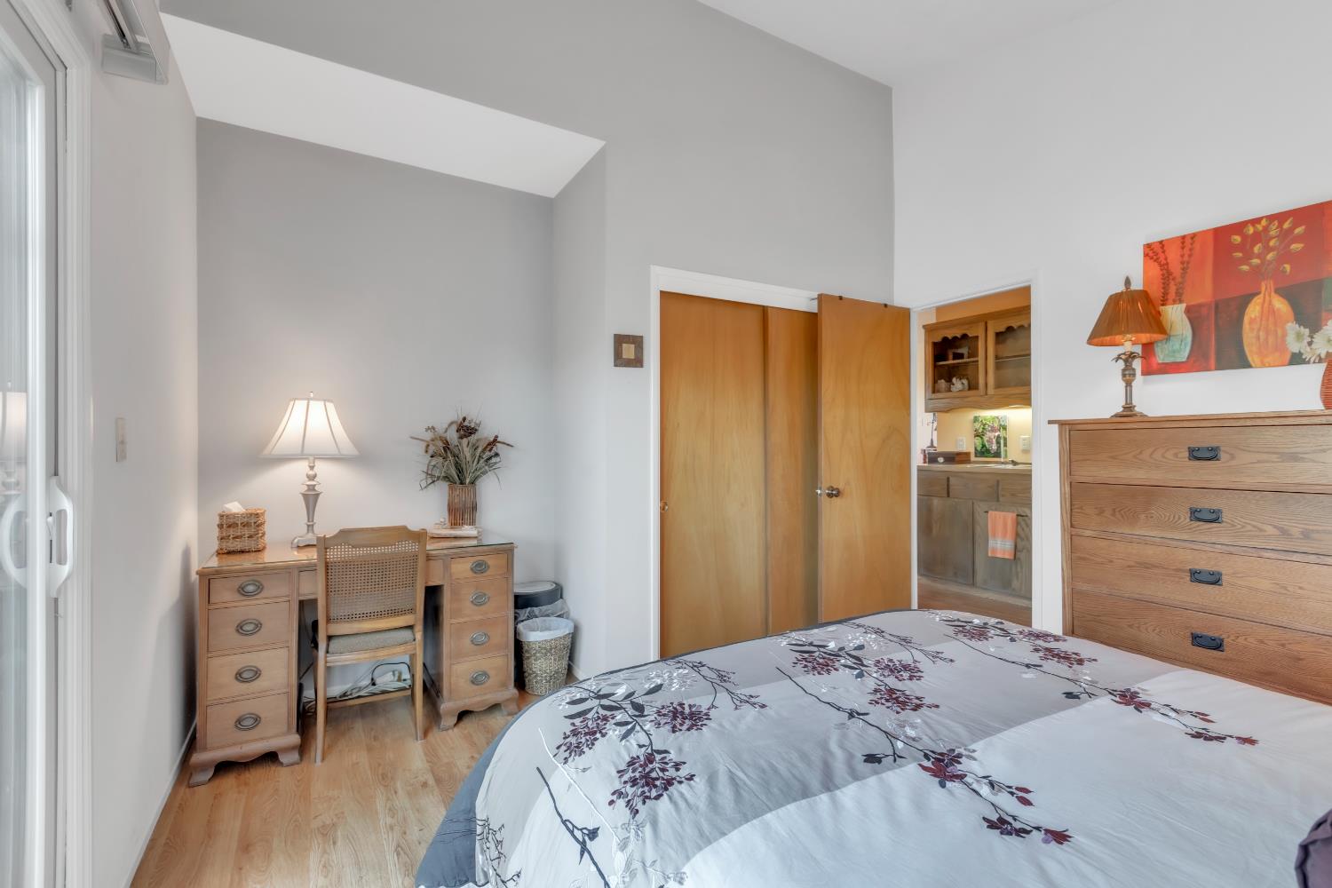 65 Poker Flat Road Copperopolis, CA 95228 - Photo 18 of 30 a bedroom with a bed and wooden floor
