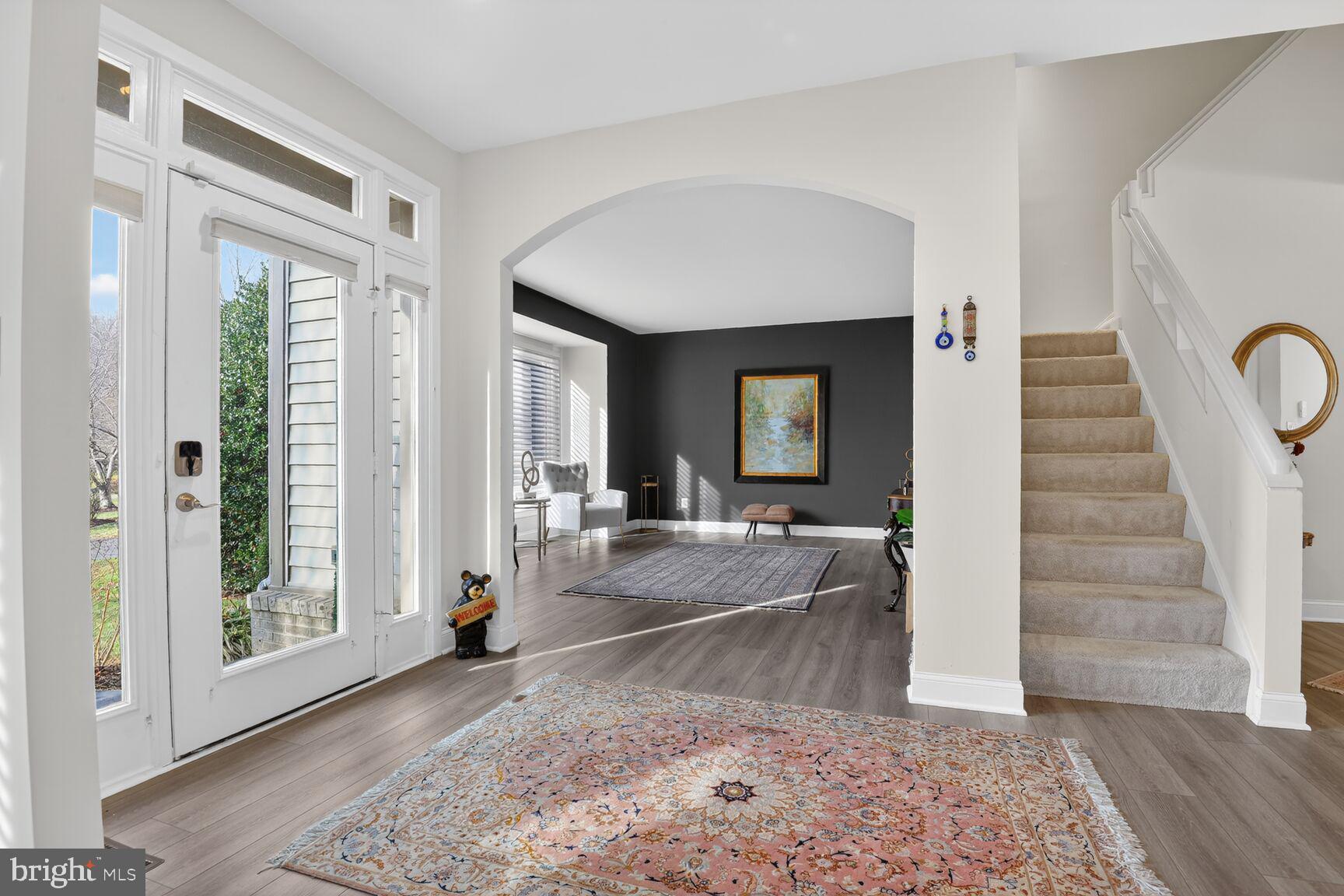 11300 Water Pointe Circle Reston, VA 20194 - Photo 2 of 36 a living room with furniture and a fireplace