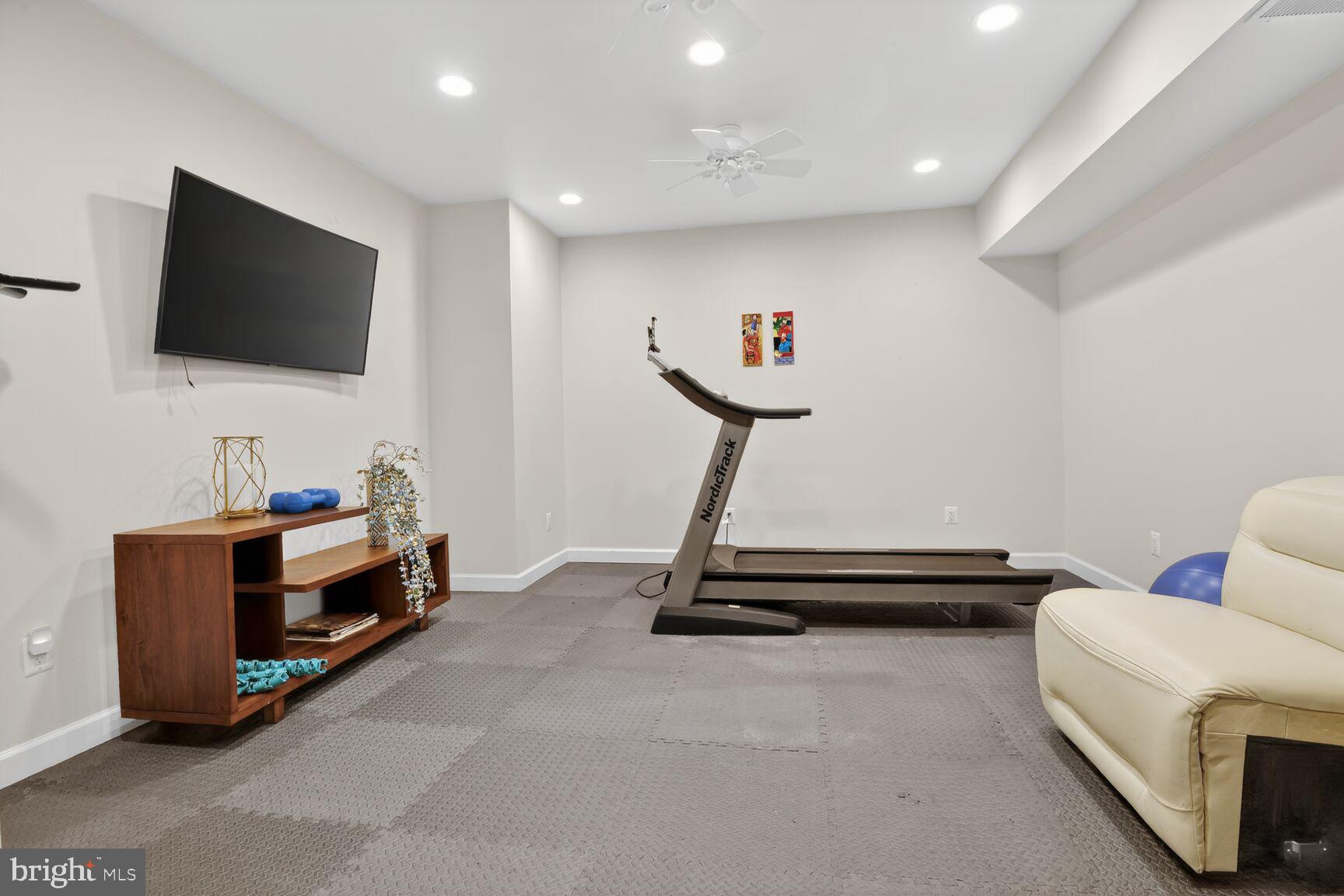 11300 Water Pointe Circle Reston, VA 20194 - Photo 28 of 36 a room with furniture and a flat screen tv