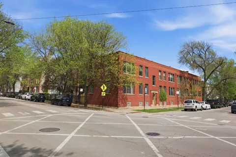 a view of street with parked cars