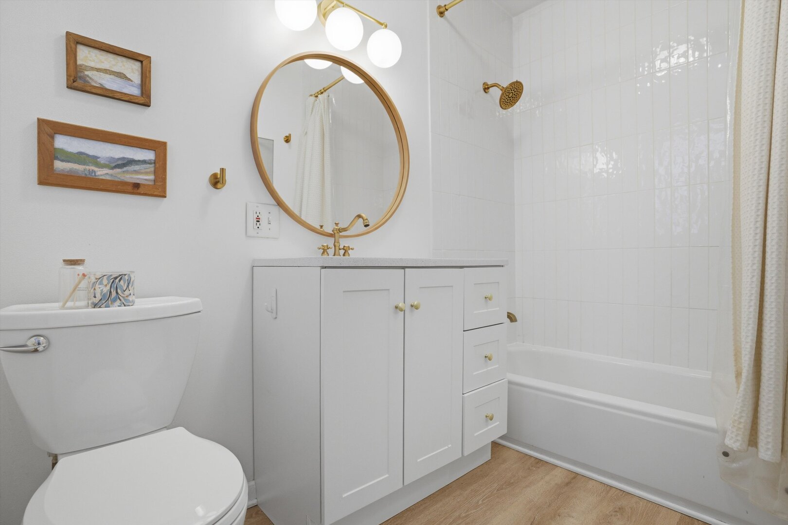 1958 West George Street, Unit 1 Chicago, IL 60657 - Photo 12 of 30 a bathroom with a toilet a sink and a mirror