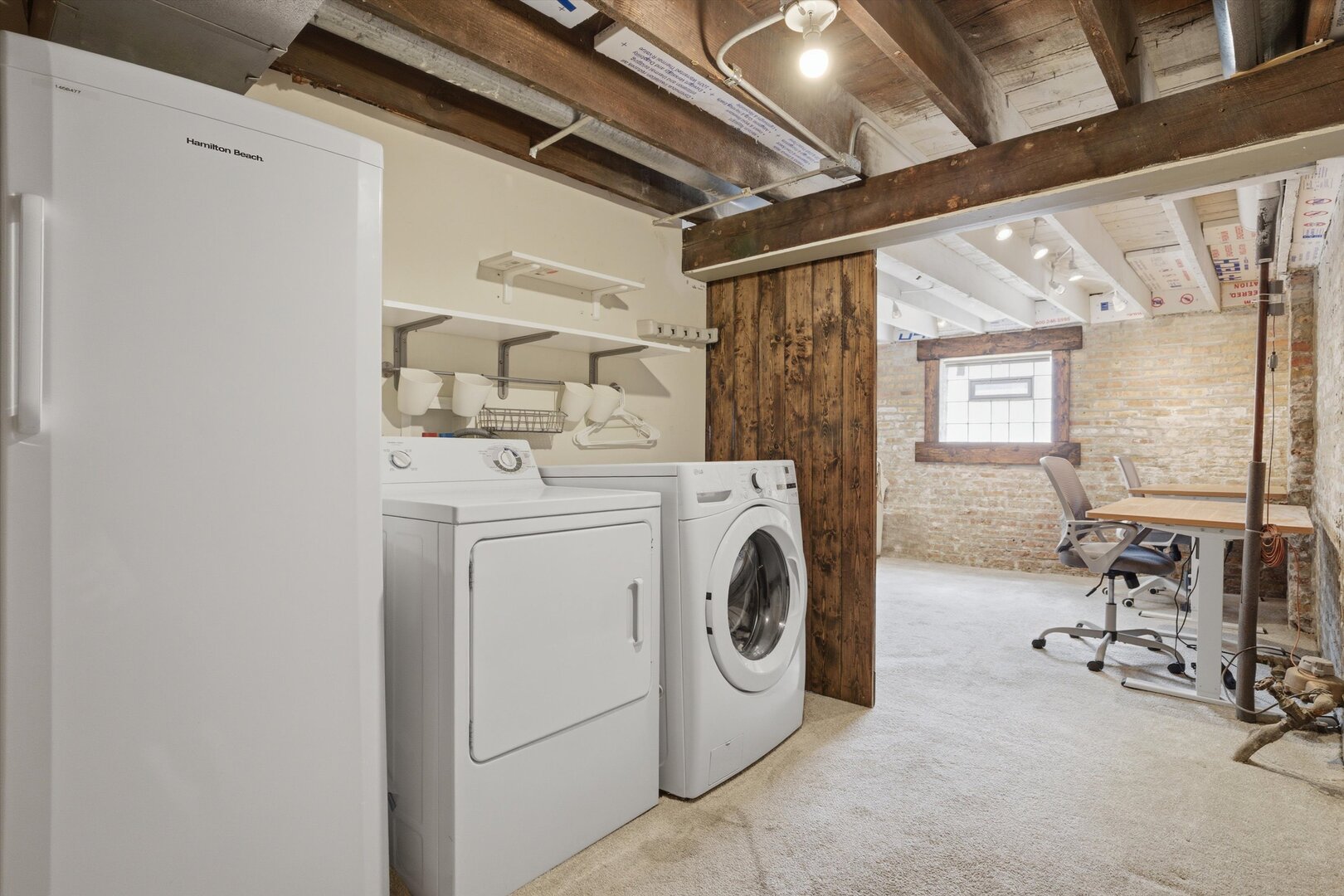 1958 West George Street, Unit 1 Chicago, IL 60657 - Photo 20 of 30 a view of a storage & utility room with dryer and washer