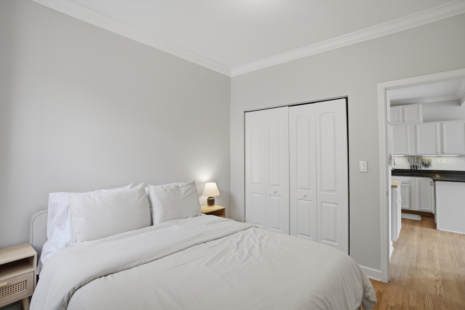 1958 West George Street, Unit 1 Chicago, IL 60657 - Photo 9 of 30 a bedroom with a bed and a view of kitchen