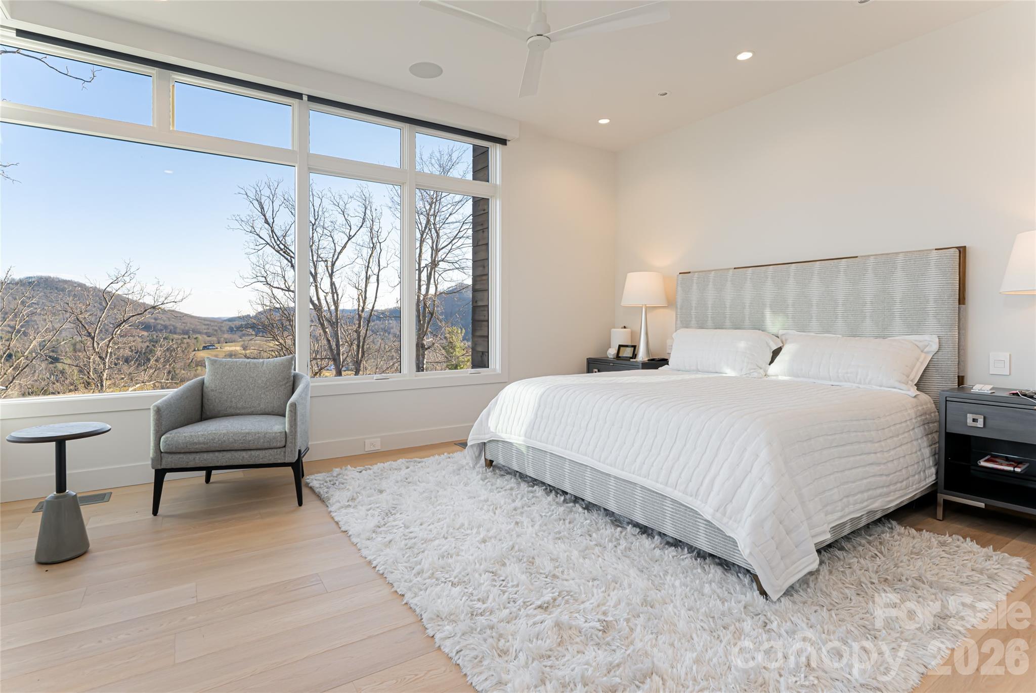 1121 Timberbluff Way Arden, NC 28704 - Photo 27 of 48 a bedroom with a bed and a large window