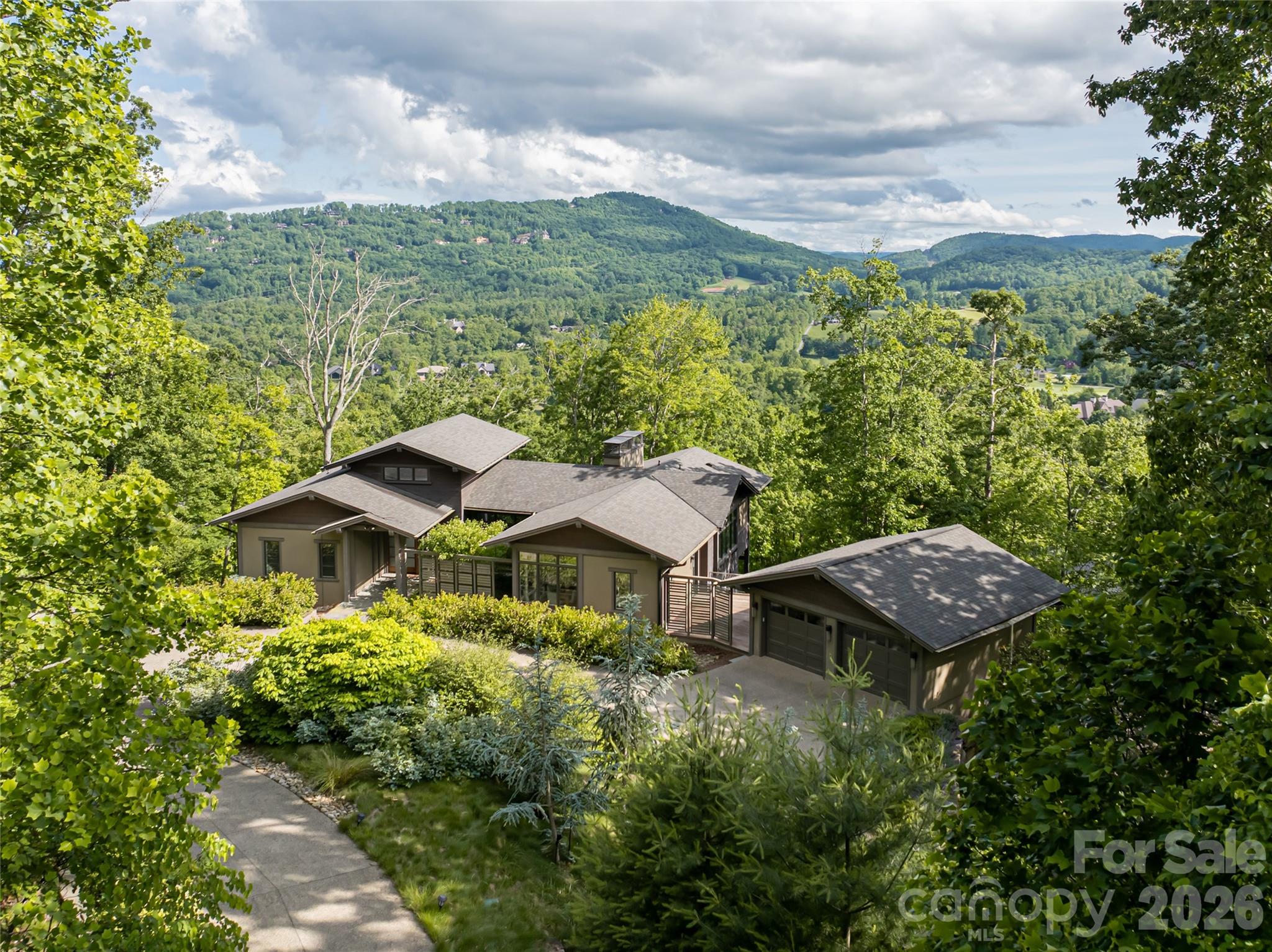 1121 Timberbluff Way Arden, NC 28704 - Photo 44 of 48 a view of a garden with an house and a trees