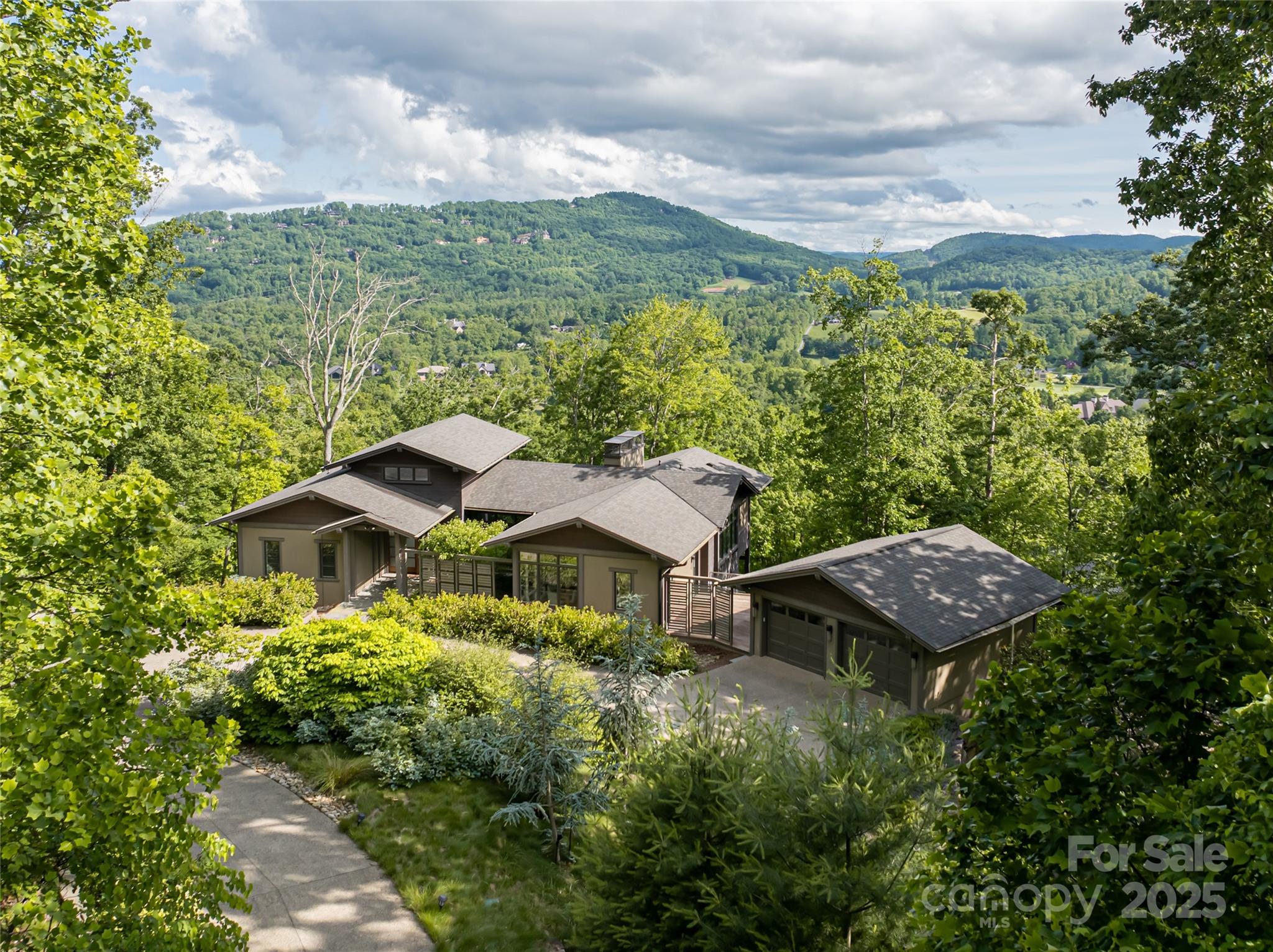 1121 Timberbluff Way Arden, NC 28704 - Photo 44 of 48 a view of a garden with an house and a trees