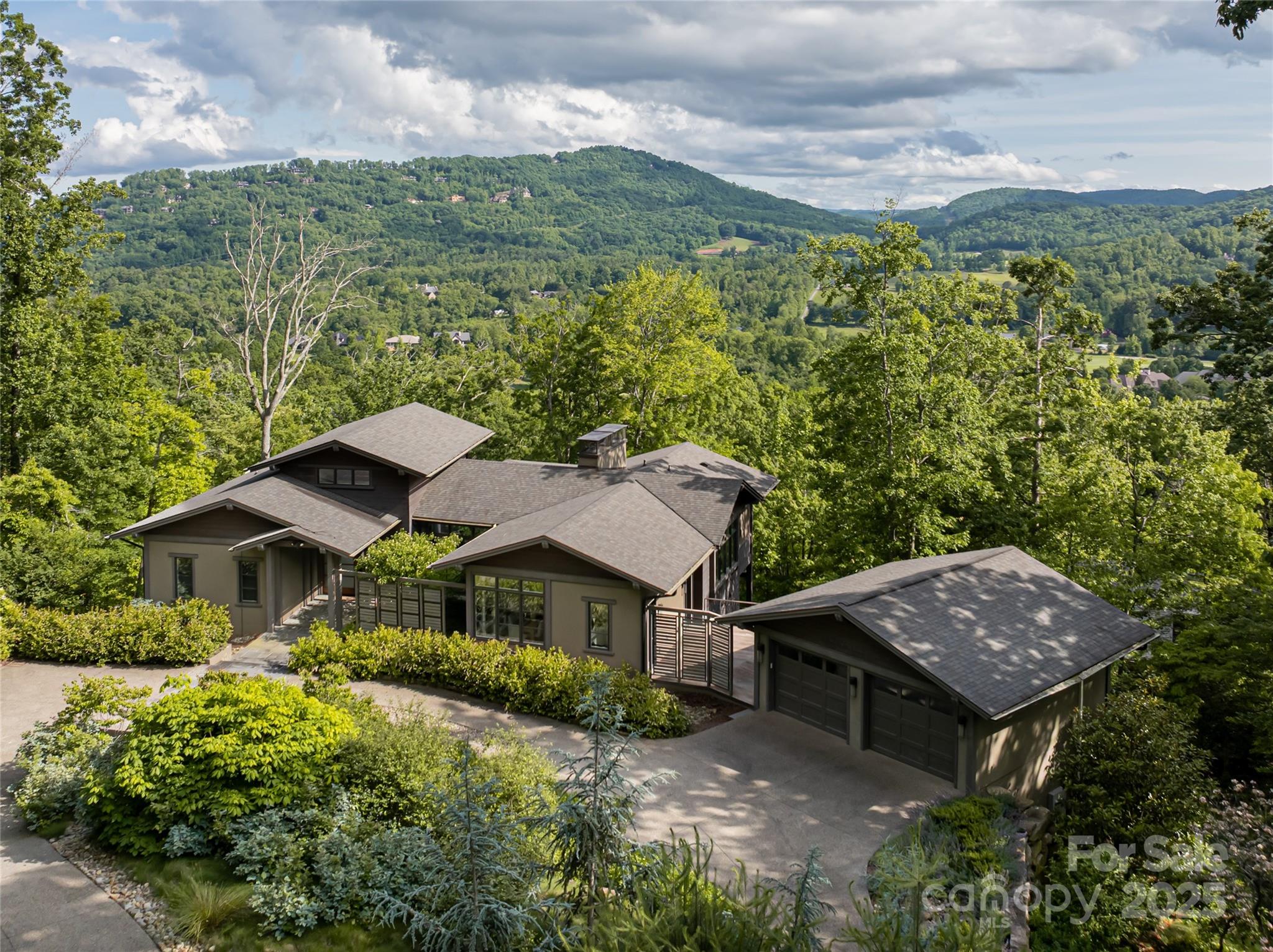 1121 Timberbluff Way Arden, NC 28704 - Photo 45 of 48 an aerial view of a house with a yard and palm trees