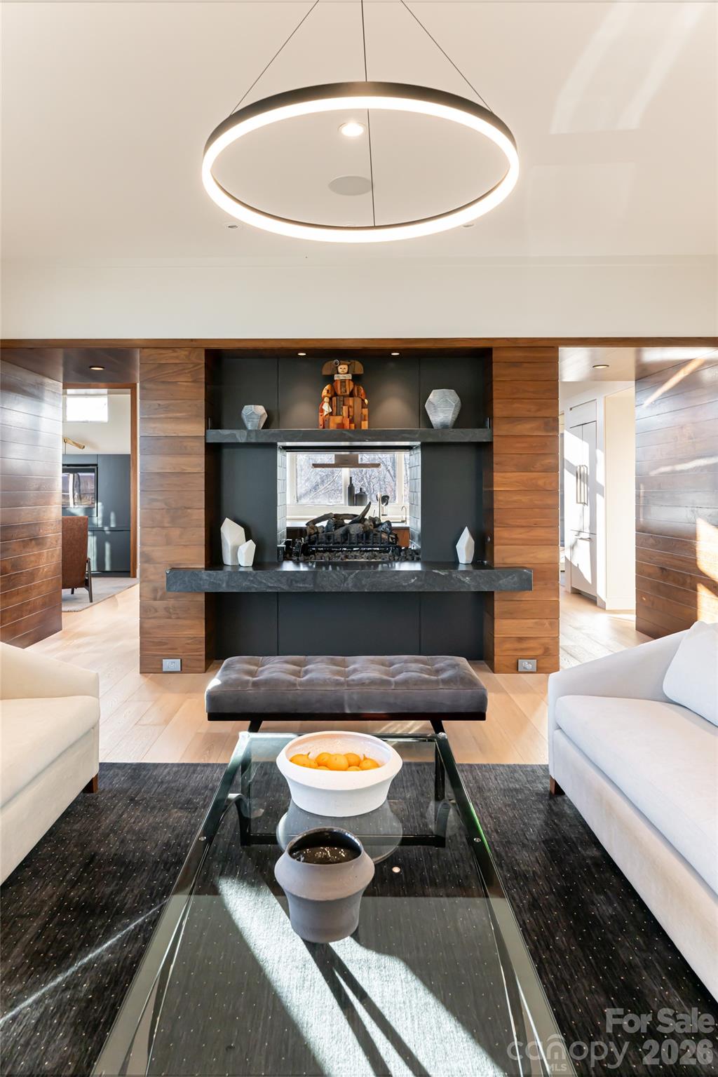 1121 Timberbluff Way Arden, NC 28704 - Photo 8 of 48 a living room with furniture a rug and white walls