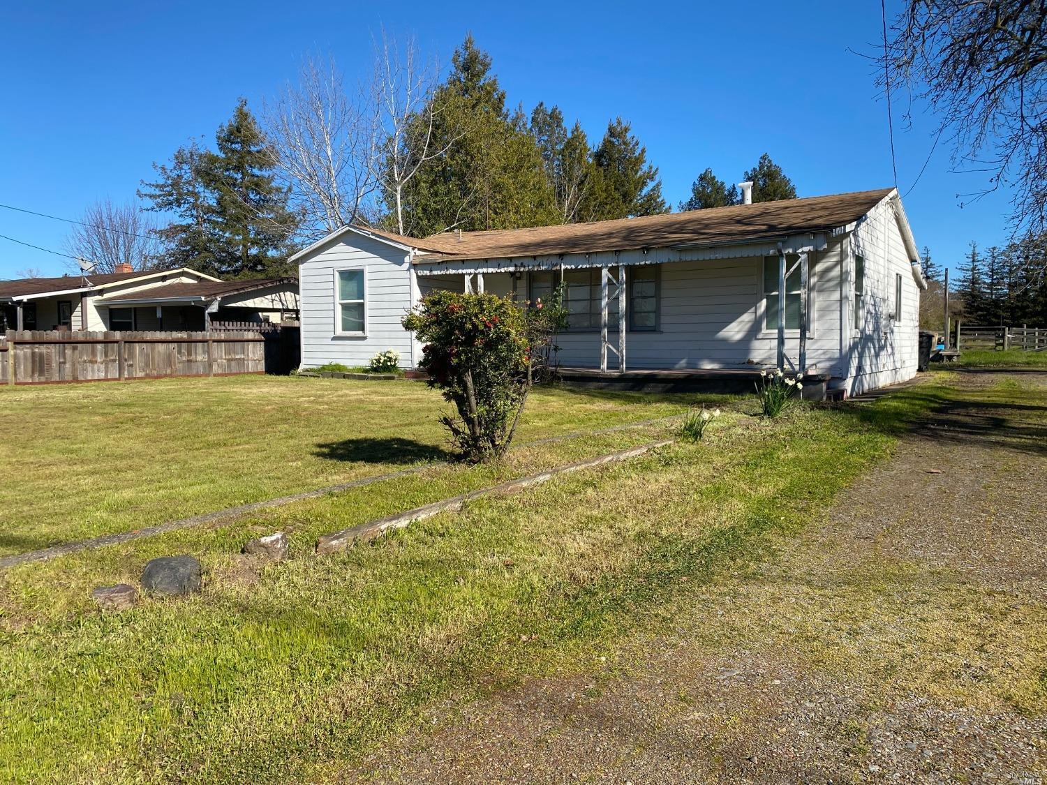Front of property. Driveway is on Hardies. .97 acre lot goes back to Range avenue.