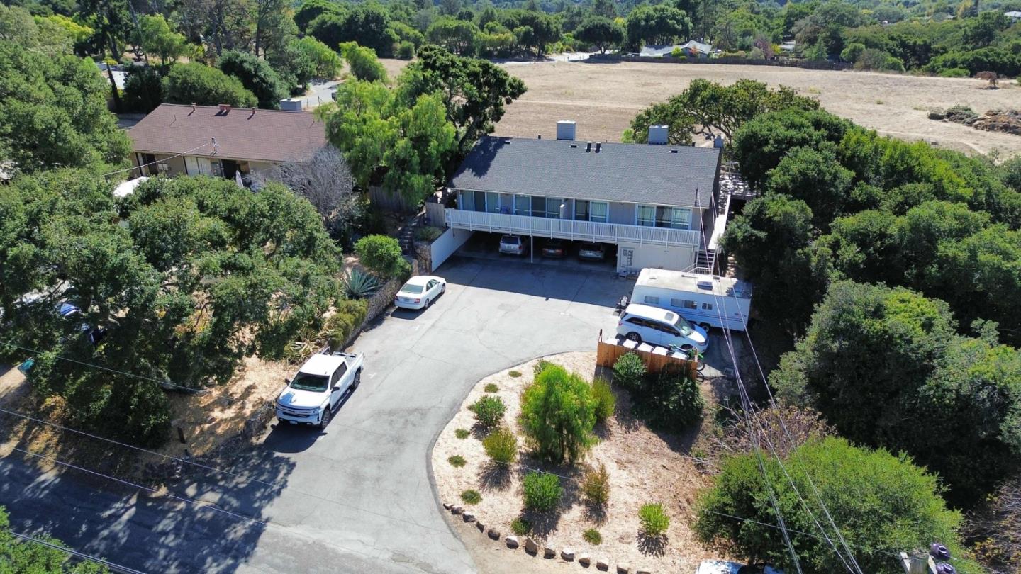151 Ford Road Carmel Valley, CA 93924 - Photo 4 of 5 an aerial view of a house with a yard and a garden