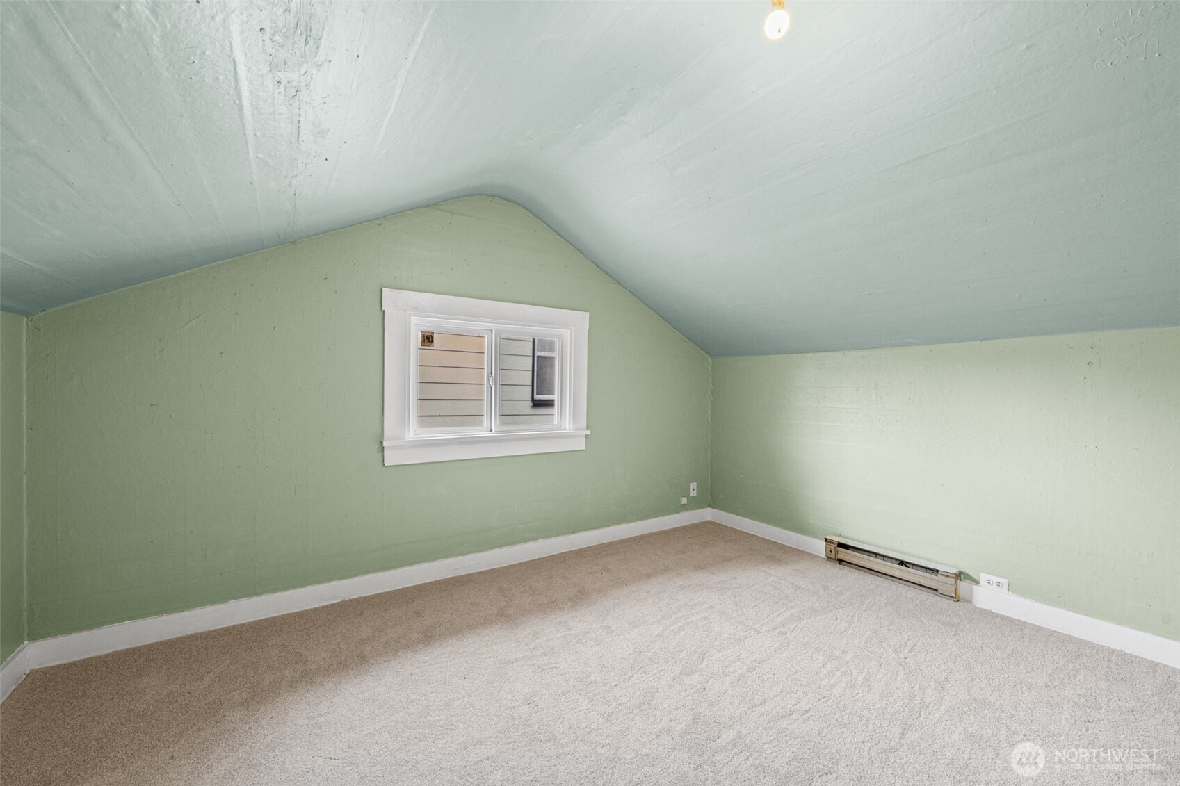 616 South Adams Street Tacoma, WA 98405 - Photo 17 of 26 an empty room with a window