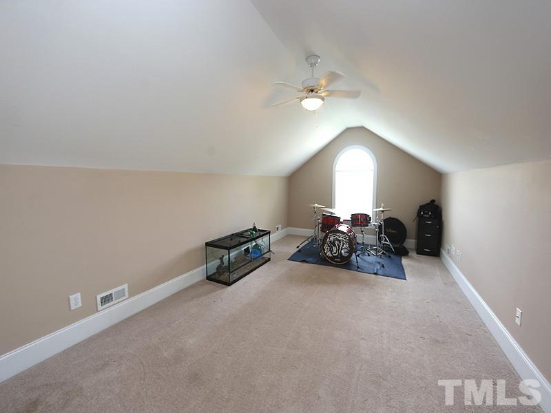 1024 Pasture View Lane Raleigh, NC 27603 - Photo 17 of 20 a view of a room with furniture and a chandelier
