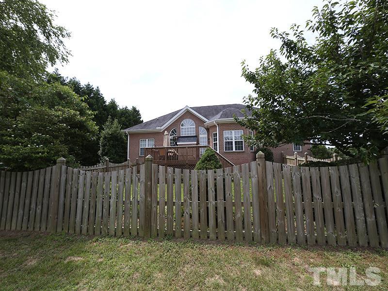 1024 Pasture View Lane Raleigh, NC 27603 - Photo 20 of 20 a view of a house with a wooden fence