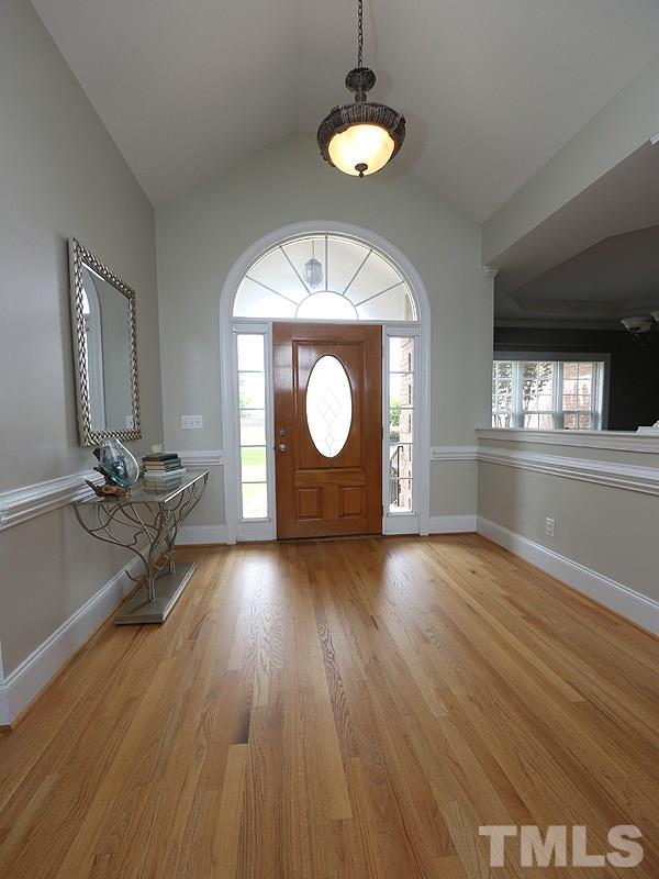 1024 Pasture View Lane Raleigh, NC 27603 - Photo 3 of 20 a view of a room with wooden floor and window