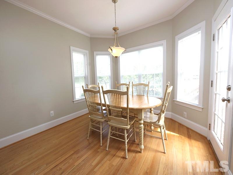 1024 Pasture View Lane Raleigh, NC 27603 - Photo 8 of 20 a dining room with furniture window wooden floor