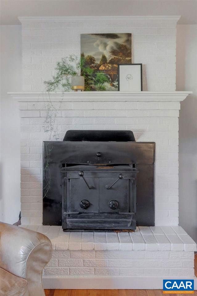 404 Blue Run Road Stanardsville, VA 22973 - Photo 17 of 43 a view of fireplace and wooden floor