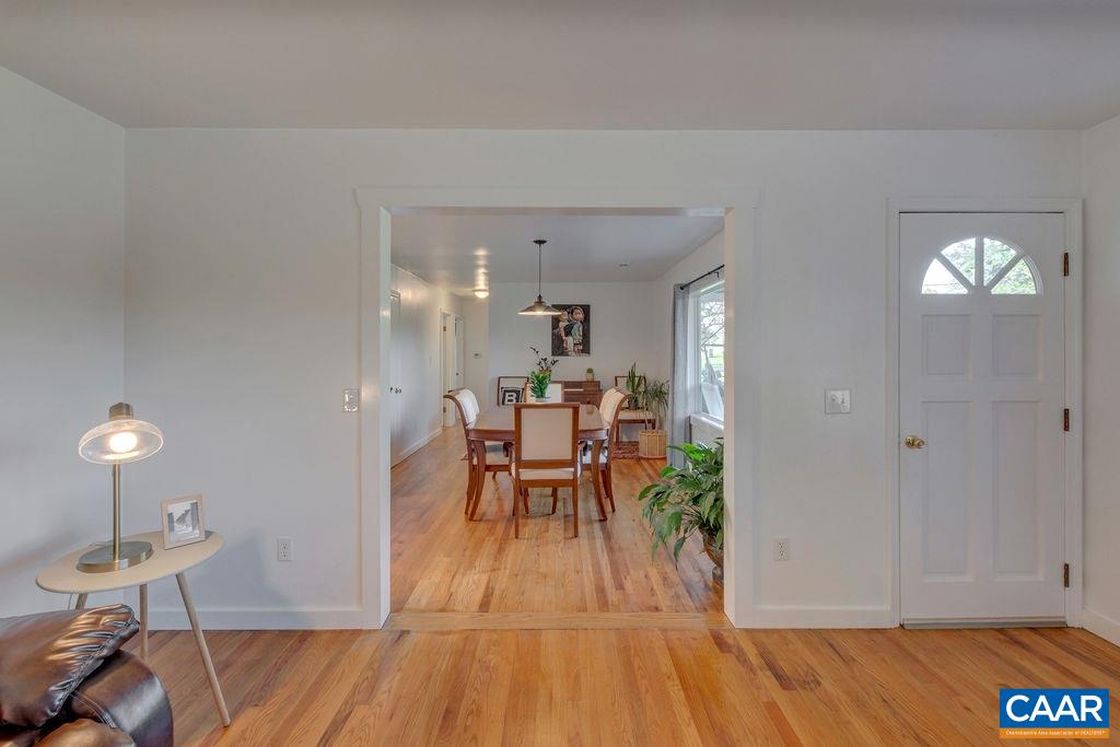 404 Blue Run Road Stanardsville, VA 22973 - Photo 19 of 43 a dining room with furniture and chandelier