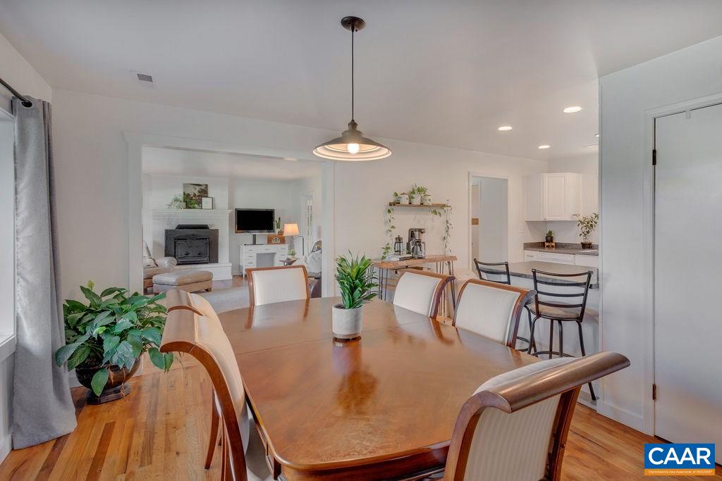 404 Blue Run Road Stanardsville, VA 22973 - Photo 23 of 43 a view of a dining room with furniture window and wooden floor