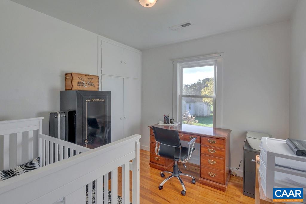 404 Blue Run Road Stanardsville, VA 22973 - Photo 33 of 43 a view of a workspace with furniture and a window