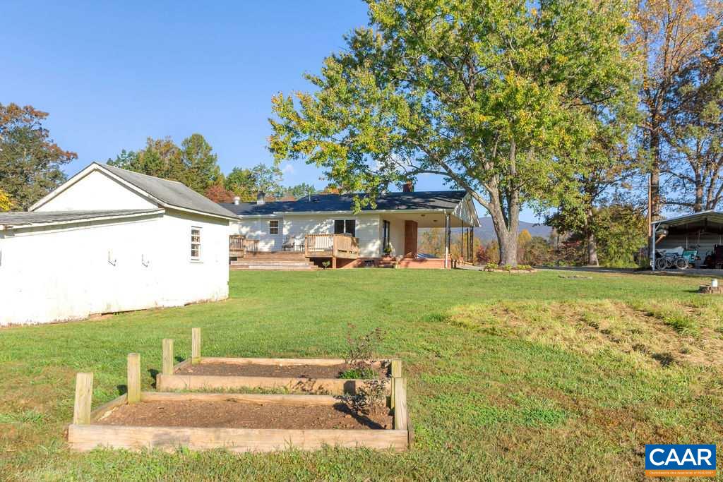 404 Blue Run Road Stanardsville, VA 22973 - Photo 40 of 43 a front view of a house with garden