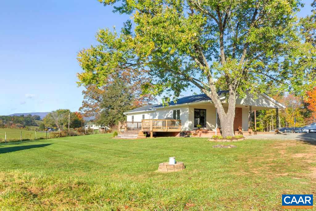 404 Blue Run Road Stanardsville, VA 22973 - Photo 41 of 43 a house view with swimming pool in front of it