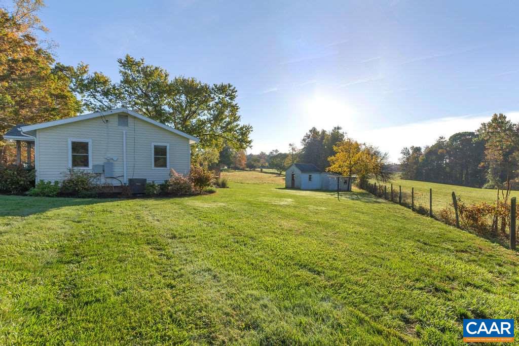 404 Blue Run Road Stanardsville, VA 22973 - Photo 5 of 43 a view of backyard of house with green space