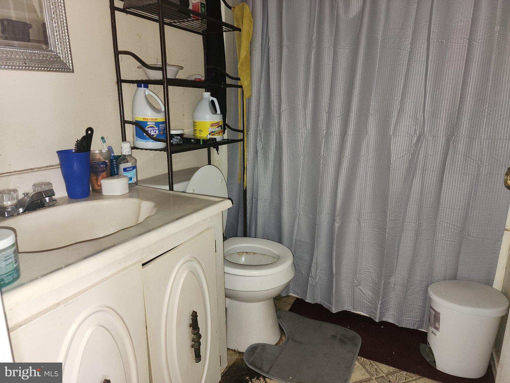 3006 Generals Way Dover, DE 19901 - Photo 9 of 10 Cozy bathroom with essential amenities.