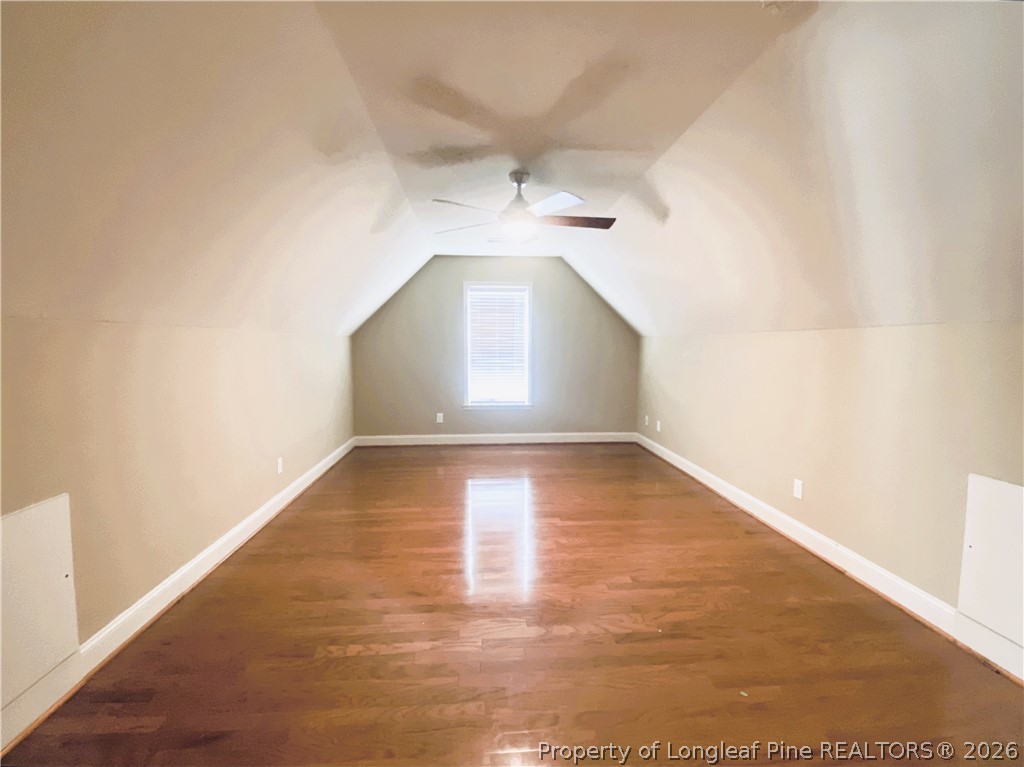 175 Pine Hawk Drive Spring Lake, NC 28390 - Photo 31 of 43 an empty room with wooden floor and windows
