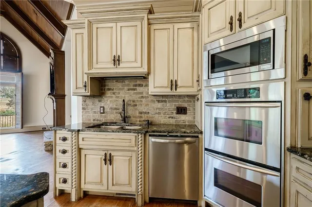a white bath tub sitting in a bathroom
