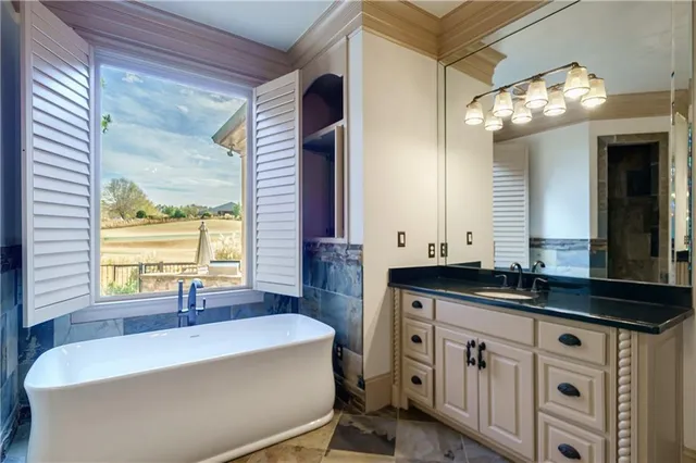 a view of empty room with windows