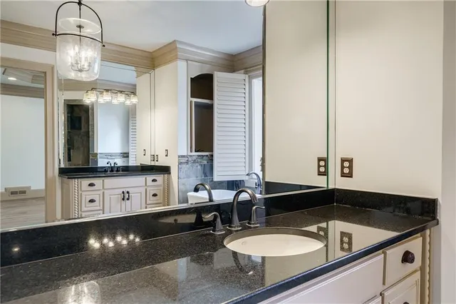 a view of an empty room with a large window