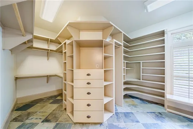 a kitchen with a stove and a refrigerator